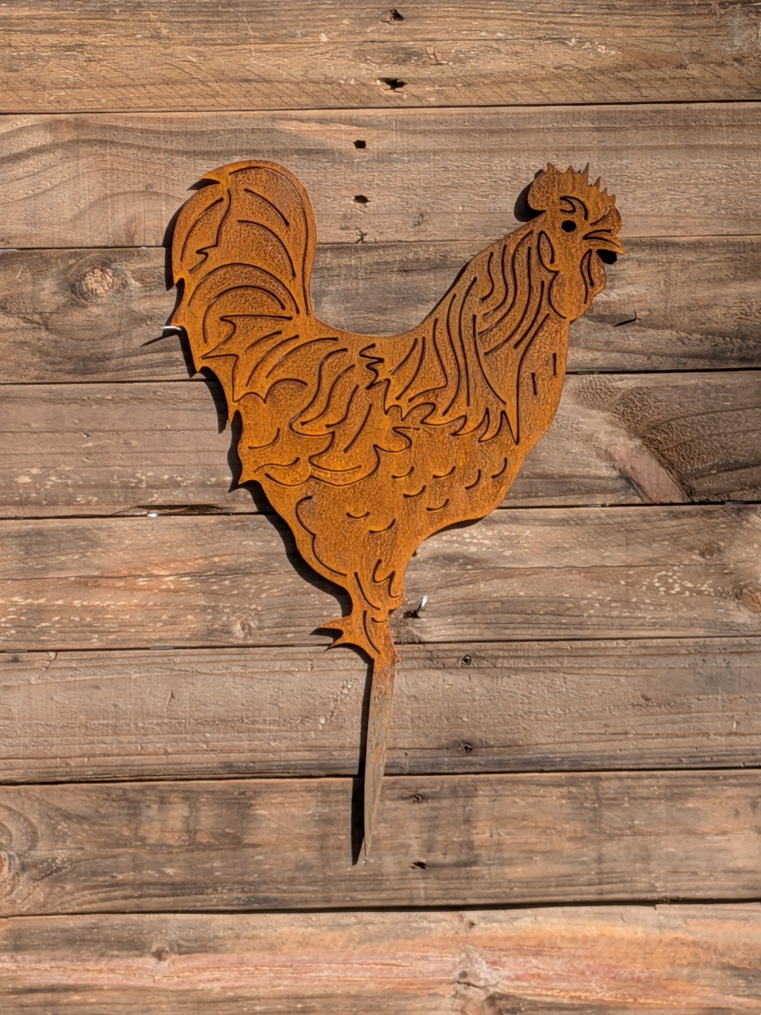Aged metal garden art